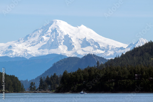 Panoramic view of Puget Sound and the snow-capped North Cascades with Mount Baker seen from a ferry.