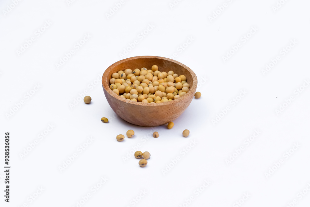 Yellow soybeans on an isolated white background, soybeans are the basic ingredient of milk and tofu Yellow soybeans on an isolated white background, soybeans are the basic ingredient of milk and tofu