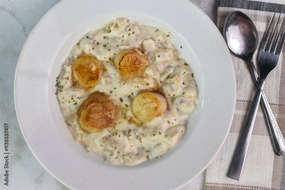 clam chowder top with herbs and scallops clam chowder top with herbs and scallops