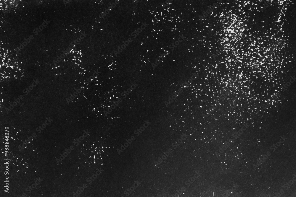 Obraz premium Texture of paper with dark gray ink as background, top view