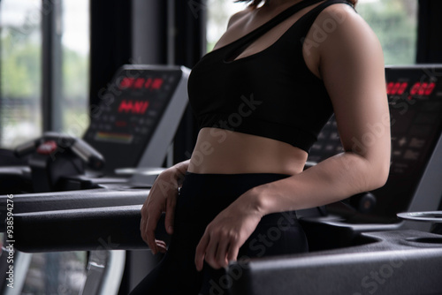 portrait beautiful young woman in fitness style at exercise class indoor. healthty concept. photo