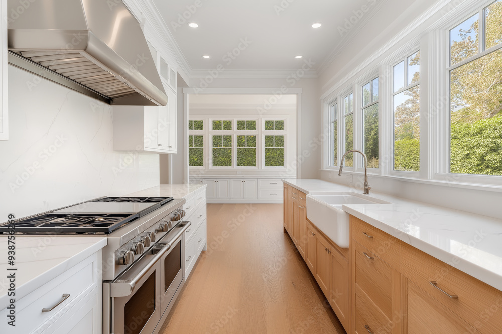 A bright and airy modern kitchen featuring sleek countertops, stainless steel appliances, and large windows that provide ample natural light A bright and airy modern kitchen featuring sleek countertops, stainless steel appliances, and large windows that provide ample natural light