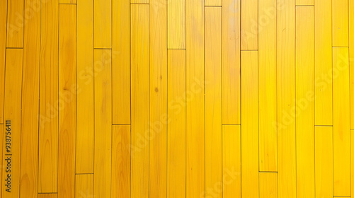 Yellow wooden parquet floor in the background, close-up of a bright yellow wood texture with a pronounced pattern of boards