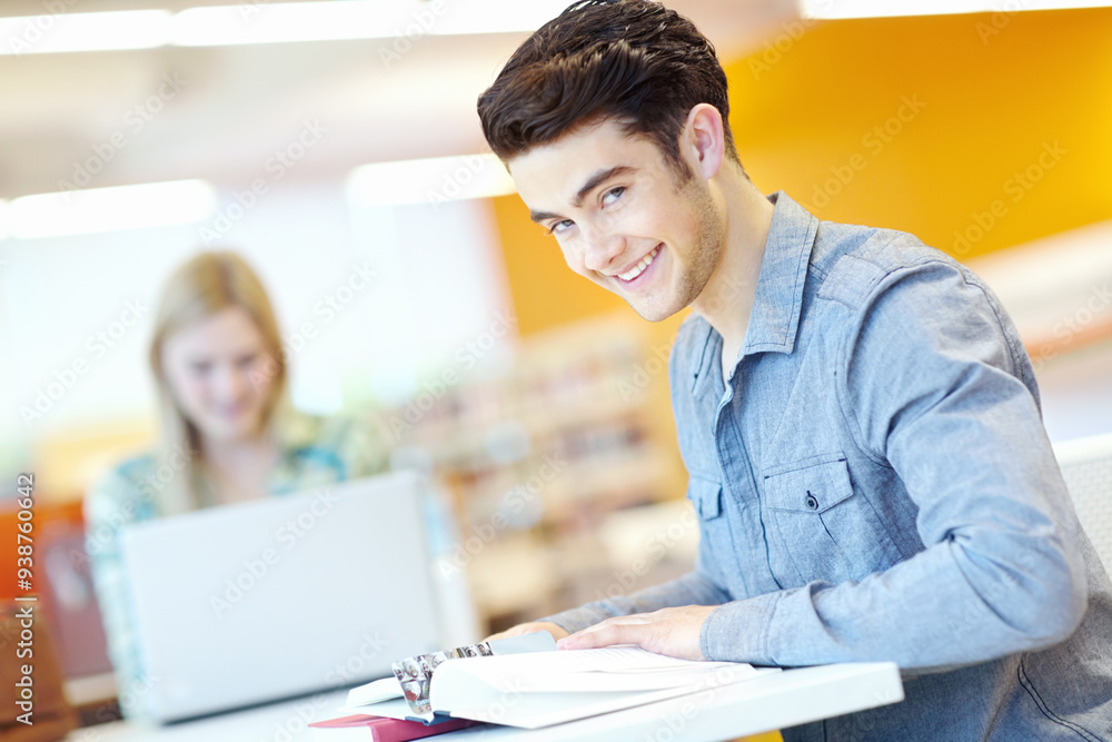Education, book and man in college for portrait, learning and studying in library. Happy student, textbook or information in literature for exam preparation, reading or research subject for knowledge Education, book and man in college for portrait, learning and studying in library. Happy student, textbook or information in literature for exam preparation, reading or research subject for knowledge