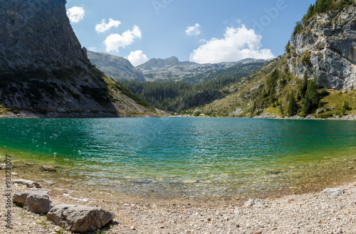 Alpine lake in high mountains, Krnsko jezero, Slovenia photo