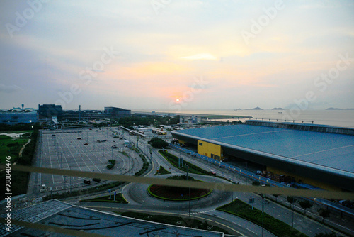 View of the sunset over the sea at Hong Kong International Airport photo