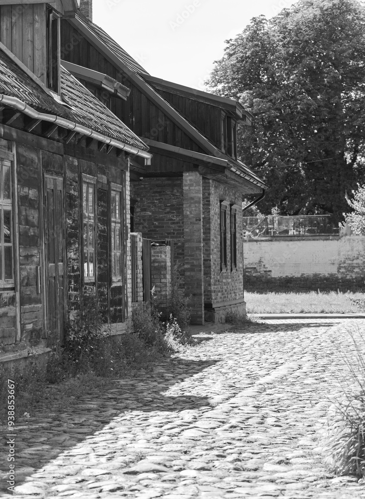 Black and white photograph of an old wooden house Black and white photograph of an old wooden house