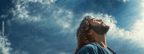 Man long hair beard standing his eyes closed Spiritual reverence