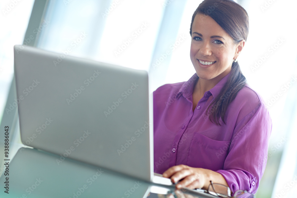 Laptop, portrait and review with business woman at desk in office for administration or online research. Computer, information and smile with happy employee in professional workplace for development Laptop, portrait and review with business woman at desk in office for administration or online research. Computer, information and smile with happy employee in professional workplace for development