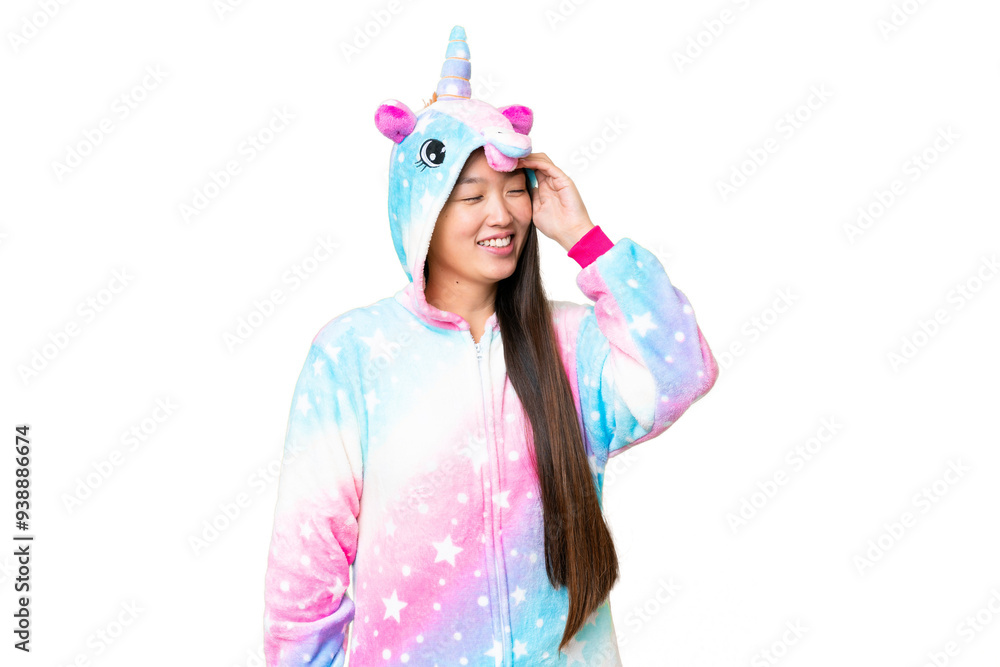 Young Asian woman with unicorn pajamas over isolated chroma key background has realized something and intending the solution Young Asian woman with unicorn pajamas over isolated chroma key background has realized something and intending the solution