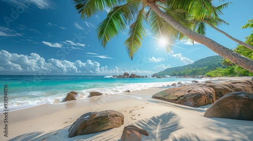 Palm trees and granite rocks on the white sand of the Seychelles beach. Simply paradise.