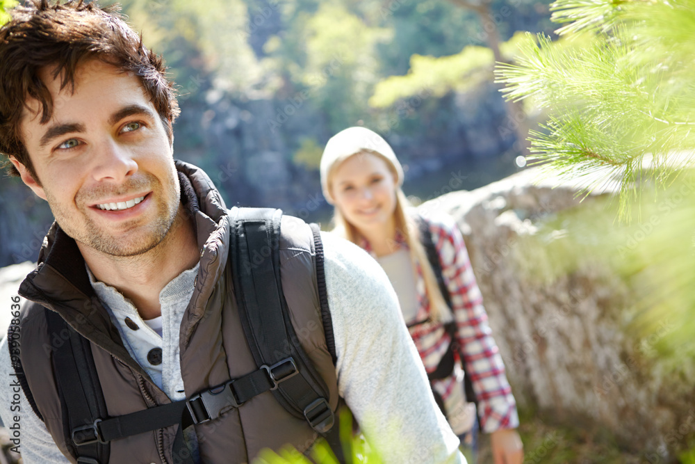 Mountain, trekking or happy couple hiking in woods for love or romantic outdoor adventure in nature. Journey, hikers or people in forest together on holiday vacation, trip or break to explore park Mountain, trekking or happy couple hiking in woods for love or romantic outdoor adventure in nature. Journey, hikers or people in forest together on holiday vacation, trip or break to explore park