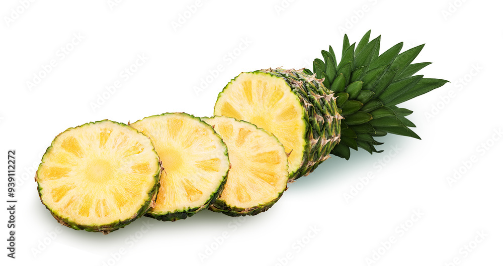 Pineapple fruit cut in half ane sliced rings Pineapple fruit cut in half ane sliced rings