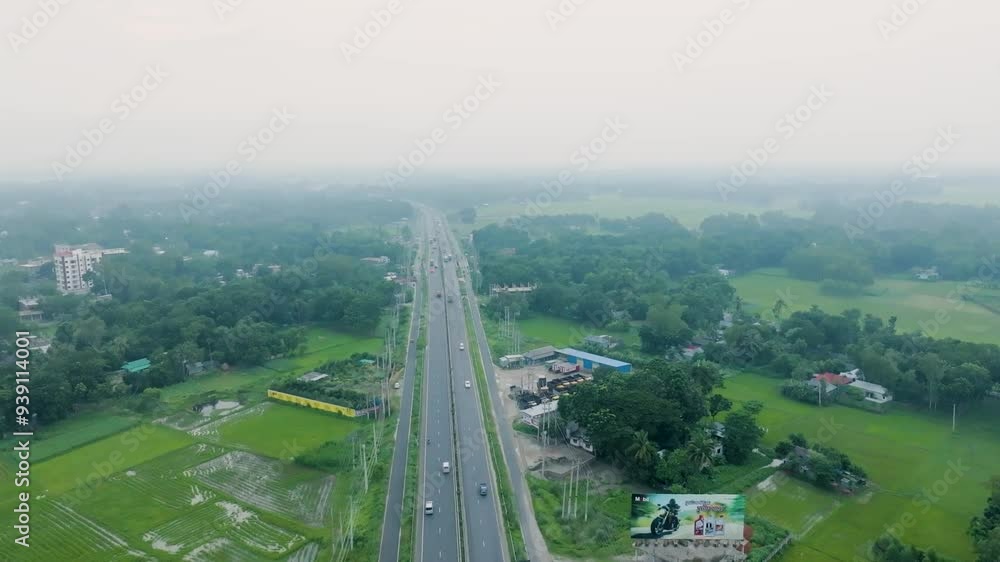 Aerial view of the asian highway and field besides Aerial view of the asian highway and field besides