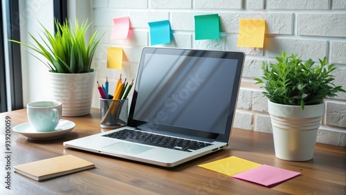 Sleek laptop and tablet devices on a minimalist desk, surrounded by colorful sticky notes and trendy office supplies, symbolizing efficient modern workflow management. photo