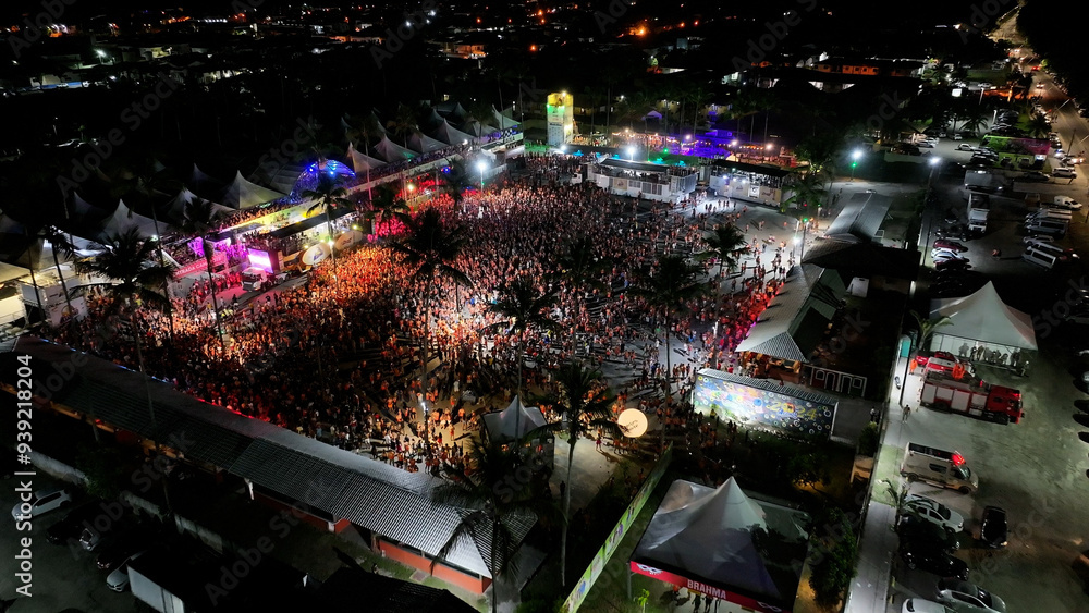 Fototapeta premium Carnival Ride In Porto Seguro Bahia Brazil. Carnival Parade. Tourism Attraction. Bahia Brazil. Stadium Arena. Carnival Ride In Porto Seguro Bahia Brazil. Amazing Carnival Rides Aerial View.