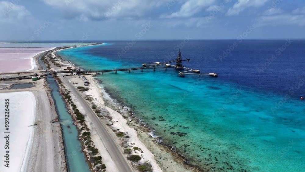 Fototapeta premium Salt Pier At Kralendijk In Bonaire Netherlands Antilles. Island Beach. Blue Sea Landscape. Kralendijk At Bonaire Netherlands Antilles. Tourism Background. Nature Seascape.