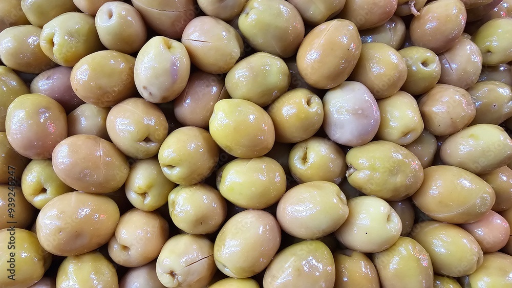Close-Up of Juicy Olives in Various Colors - Green, Black, Purple, Red, Pink, and Brown Olives market Close-Up of Juicy Olives in Various Colors - Green, Black, Purple, Red, Pink, and Brown Olives market