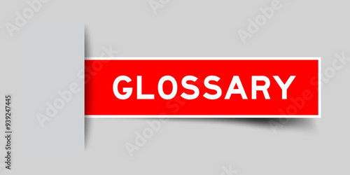 Red color square shape sticker label with word glossary inserted in gray background