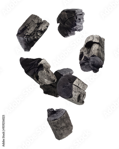 Charcoal forms an abstract figure in space. Isolated on white