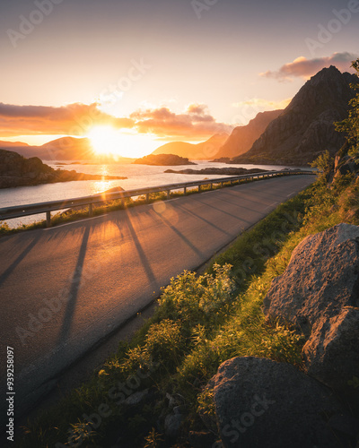 Mountain road at beautiful sunset in Lofoten Islands, Norway.