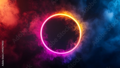 Red and blue flames in a glowing circle with pink smoke on a black background.