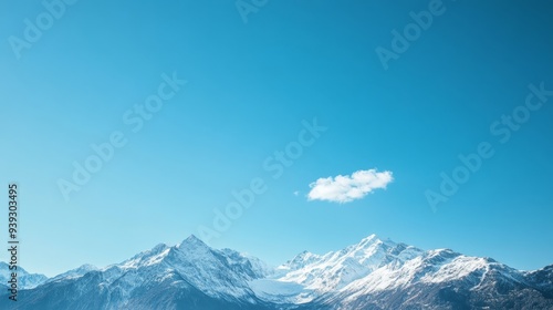 Majestic Snowcapped Peaks Reaching Towards Cloudy Sky in Scenic Alpine Landscape