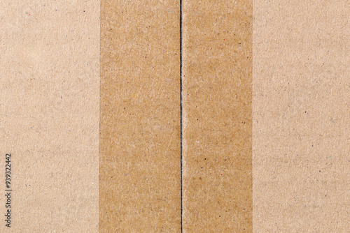 View top of cardboard with adhesive tape on it.