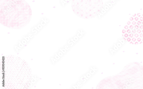 ピンクの和柄と桜吹雪の背景、中央にコピースペース