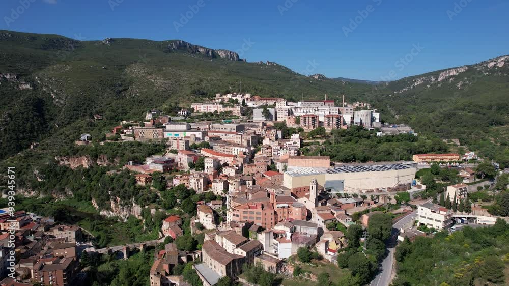 Tilt down aerial shot of La Riba town on sunny summer day. Tarragona Province, Spain. Tilt down aerial shot of La Riba town on sunny summer day. Tarragona Province, Spain.