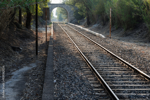 Hermoso paisaje de la vía ferroviaria que une Alcoy con Valencia en la pequeña y turistica localidad de Agres, España photo