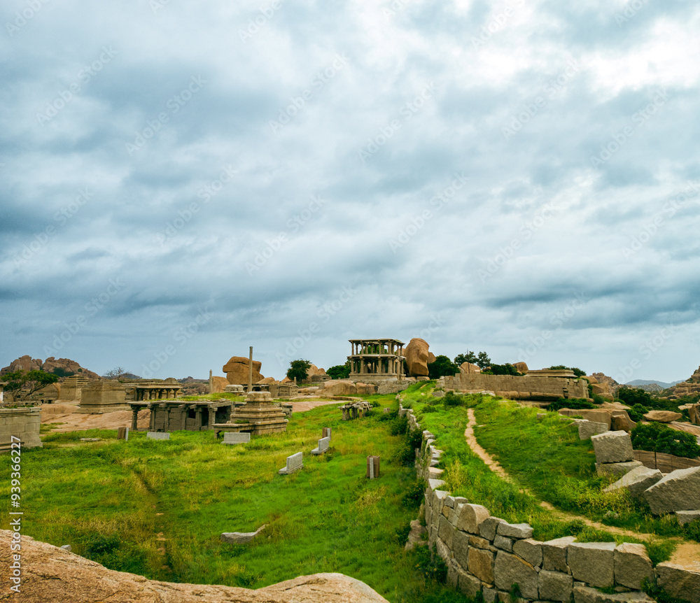 ruins of the castle of Hampi. A beautiful scenery in green field .
Hampi in Karnataka ruins of the castle of Hampi. A beautiful scenery in green field .
Hampi in Karnataka