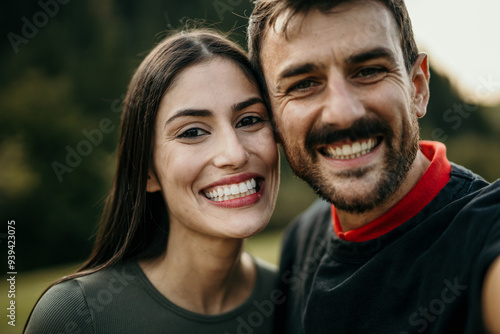 Cropped shot of two attractive young people posing for a selfie while in the nature during the day