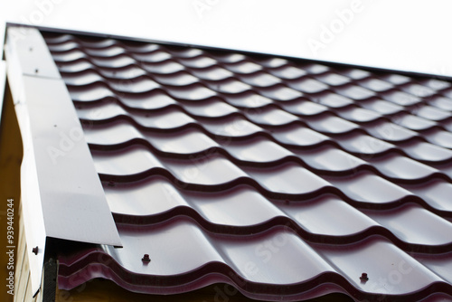 Metal tile.Roof for the house. Modern coatings for the roof of the house. photo