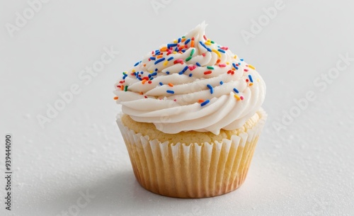 Vanilla Cupcake with Whipped Cream Frosting and Colorful Sprinkles
