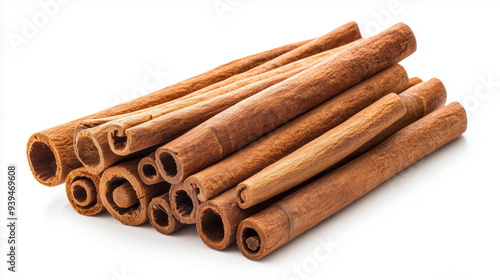 Pile of cinnamon sticks isolated on a white background 