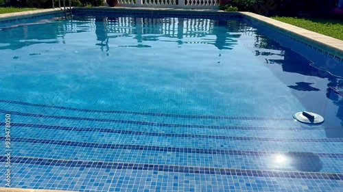 Slow Motion of a Calm Swimming Pool with Gentle Ripples
