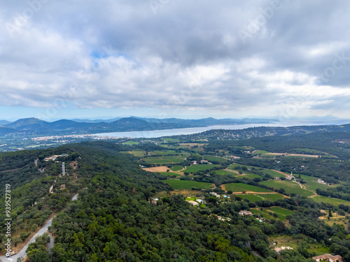 Aerial view on green hills, houses, gulf of saint-tropez, Gassin village, vineyards, Provence, Var, France