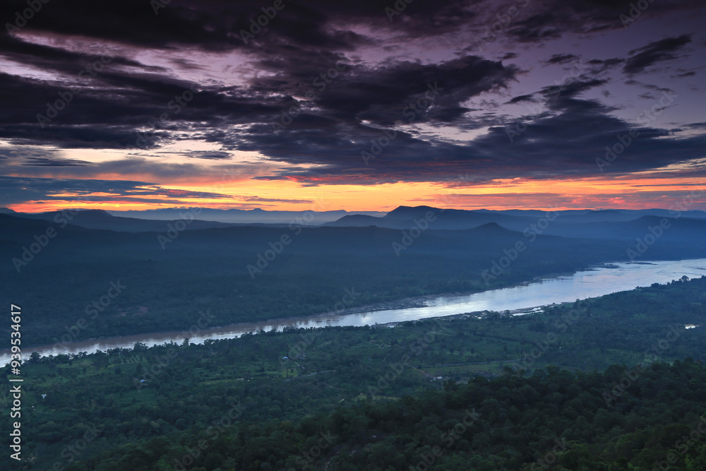 Fototapeta premium Beautiful first light at Pha Chanadai Cliff, Pha taem National Park, Ubon Ratchathani Province, Thailand 