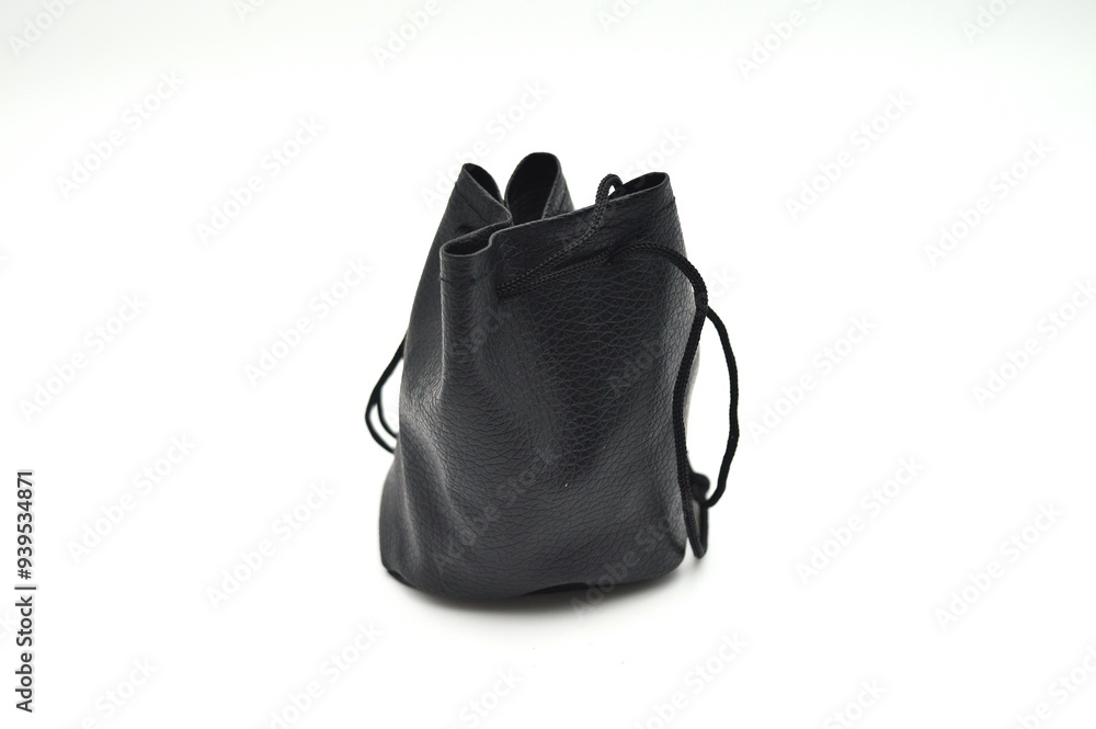 A black leather drawstring bag with a minimalist design is displayed against a white background A black leather drawstring bag with a minimalist design is displayed against a white background