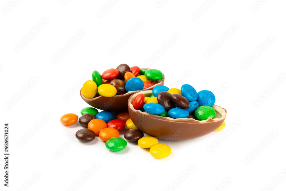 Easter chocolate egg isolated on white background. Easter celebration concept. Happy Easter. Chocolate sweet eggs. Candies on textured wooden table. Space for text.Copy space Easter chocolate egg isolated on white background. Easter celebration concept. Happy Easter. Chocolate sweet eggs. Candies on textured wooden table. Space for text.Copy space