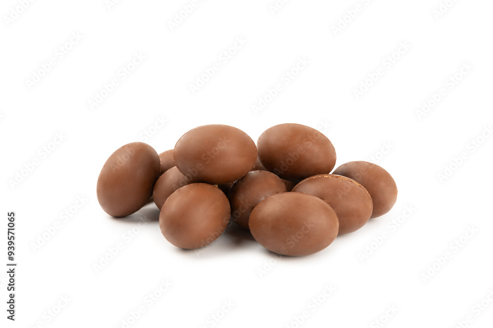 Easter chocolate egg isolated on white background. Easter celebration concept. Happy Easter. Chocolate sweet eggs. Candies on textured wooden table. Space for text.Copy space Easter chocolate egg isolated on white background. Easter celebration concept. Happy Easter. Chocolate sweet eggs. Candies on textured wooden table. Space for text.Copy space