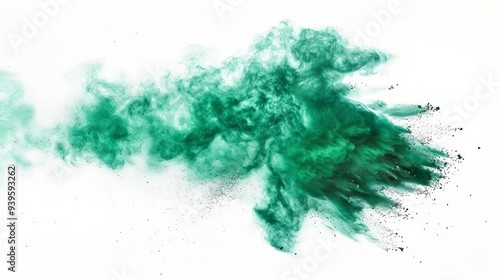 This artistic image captures a cloud of green powder dispersing in the air, forming a beautiful display of motion and intricate texture. photo