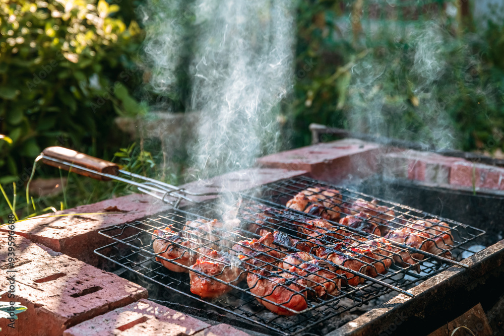 golden brown grilled chicken meat is cooked on the grill outdoors golden brown grilled chicken meat is cooked on the grill outdoors