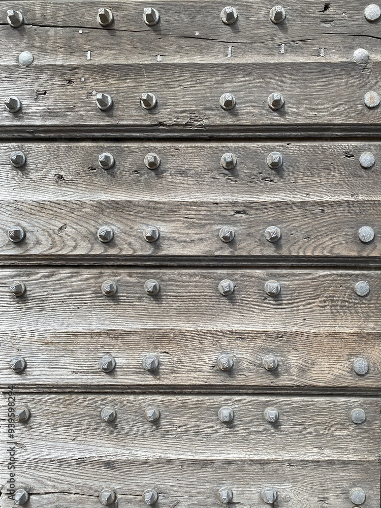 Naklejka premium Detail texture of old wooden rustic door