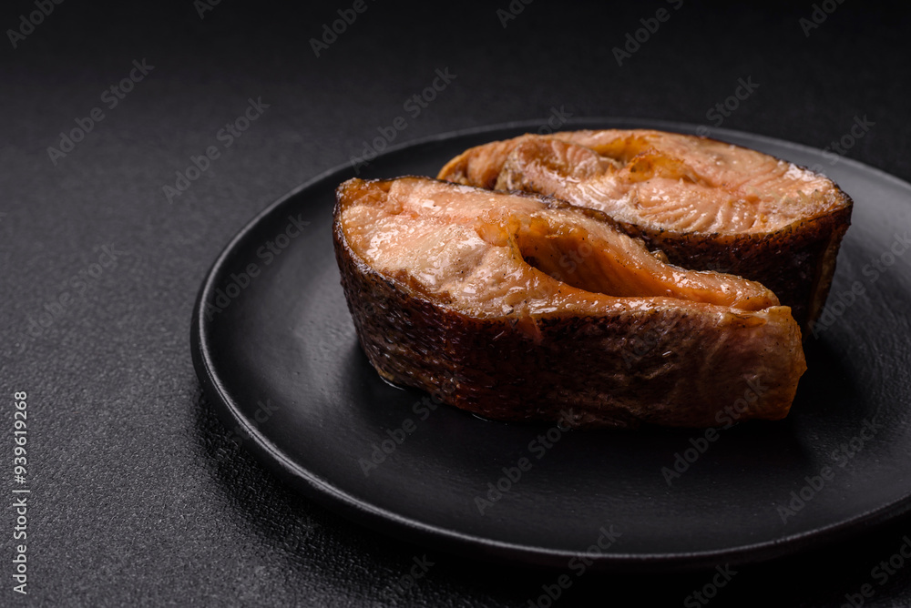 Delicious red salmon r trout fish grilled with spices and herbs Delicious red salmon r trout fish grilled with spices and herbs