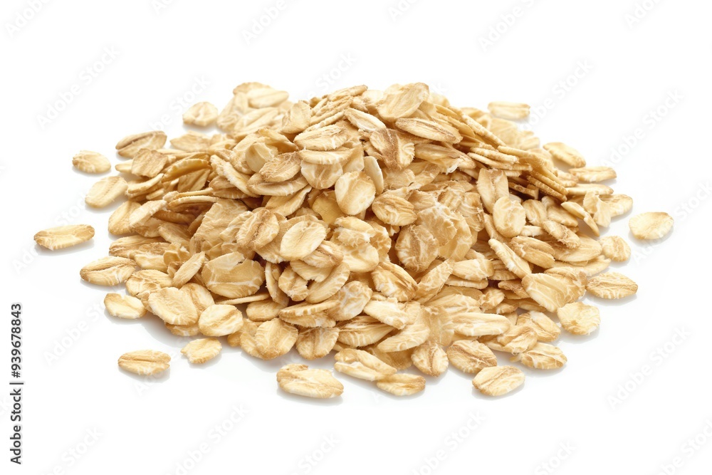 Heap of oat flakes isolated on white background. Healthy breakfast Heap of oat flakes isolated on white background. Healthy breakfast