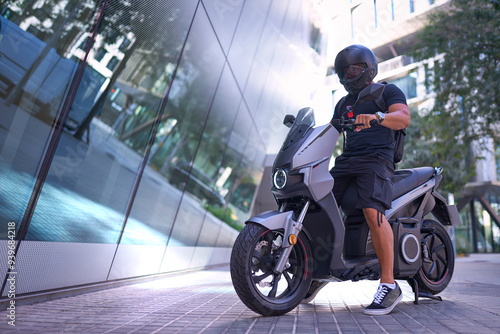 Canvas Print man on electric motorcycle