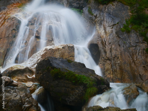 Waterfall near HinterTux on a mountain brook photo