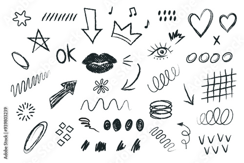 Collection of hand drawn black and white charcoal pencil doodles. Pencil or chalk sketch icons and abstract shapes of decorative design elements.